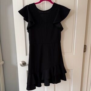 Beautiful Black Mini Dress with Asymmetrical Ruffle Bottom